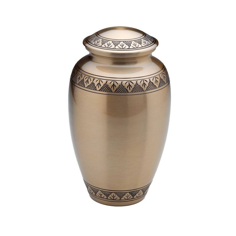 Brass urn with engraving